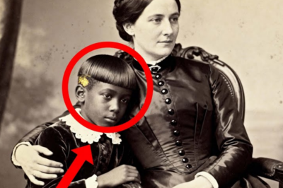 Este retrato de 1870 de una madre y su hijo parece tierno hasta que se nota el cabello del niño.